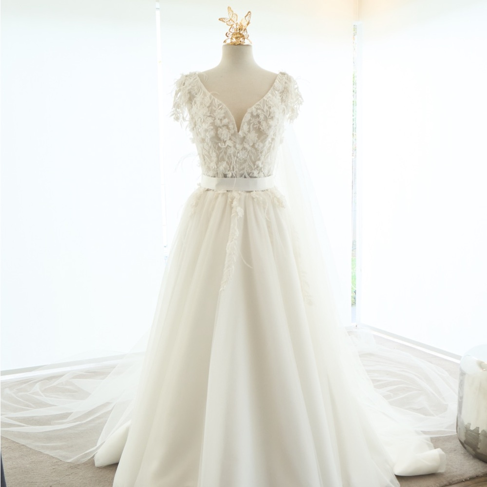 Chic Ivory Bridal Gown with Floral Accents